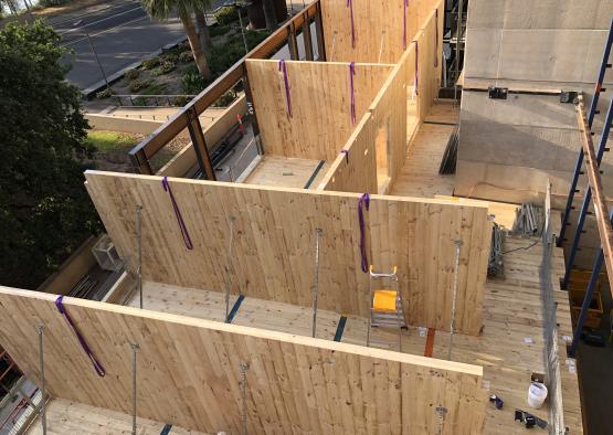 a building being built with wood