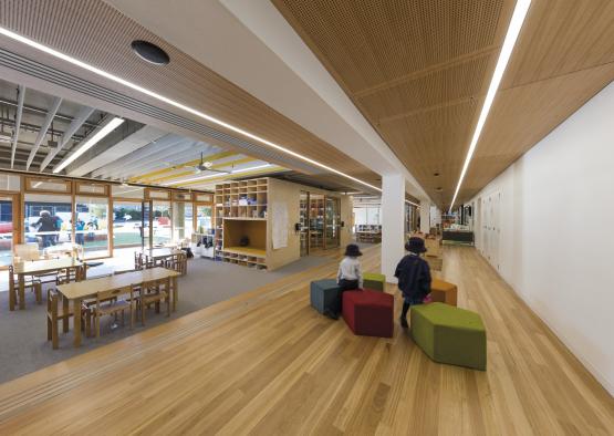 a group of kids in a library