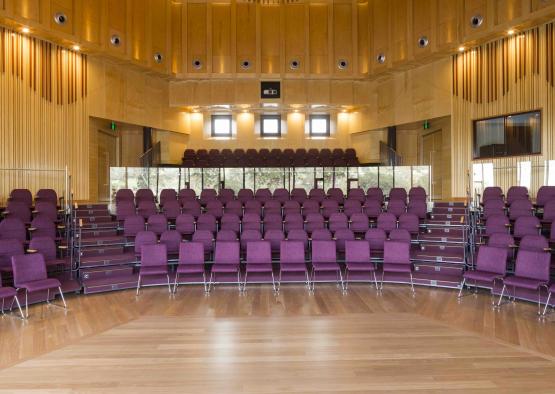 a room with purple chairs