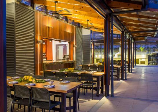 a restaurant with tables and chairs