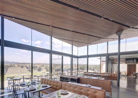 a restaurant with tables and chairs