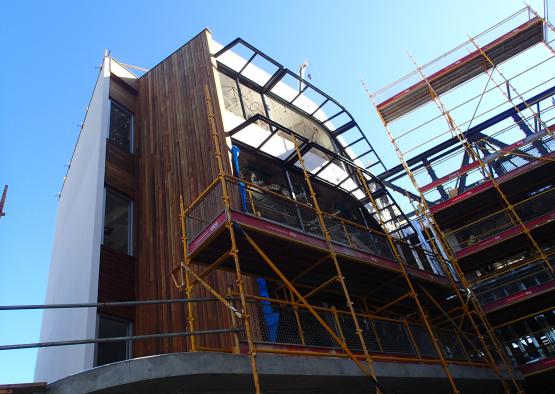 a building under construction with scaffolding