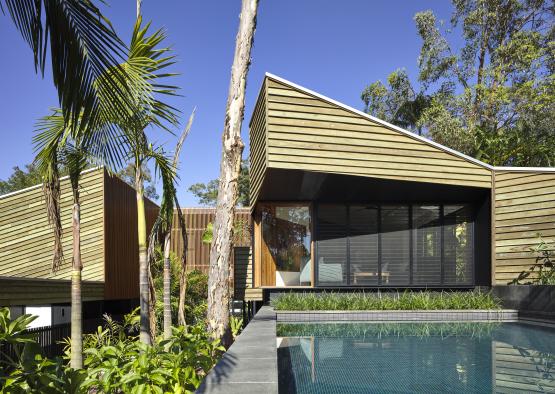 a house with a pool in the middle of it