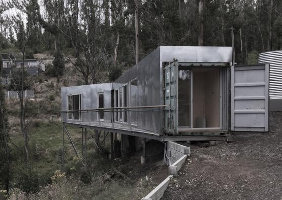 a container house on a hill