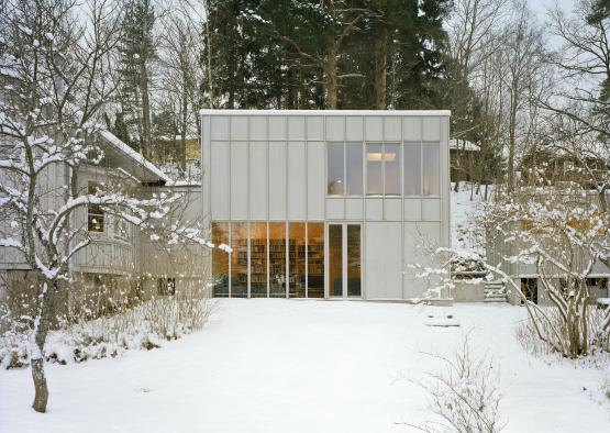 a house with snow on the ground