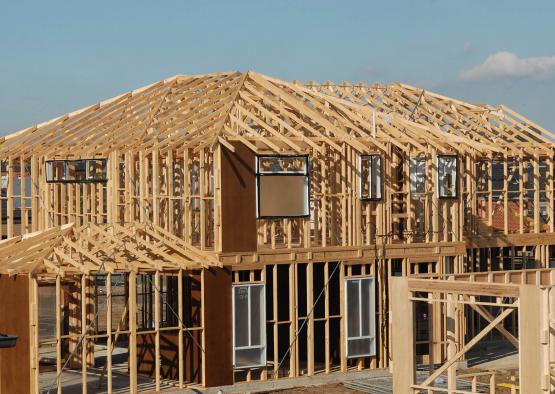 a house under construction with a roof