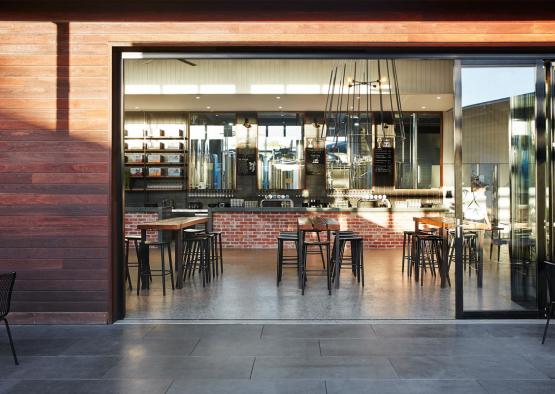 a restaurant with tables and chairs