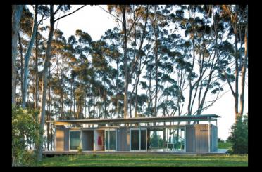 a house with trees in the background