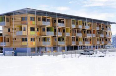 a building with snow on the ground