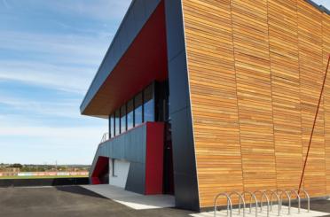 a building with a red and black wall