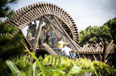 a group of people on a wooden structure