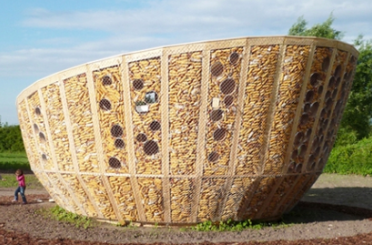 a large container with a wire mesh